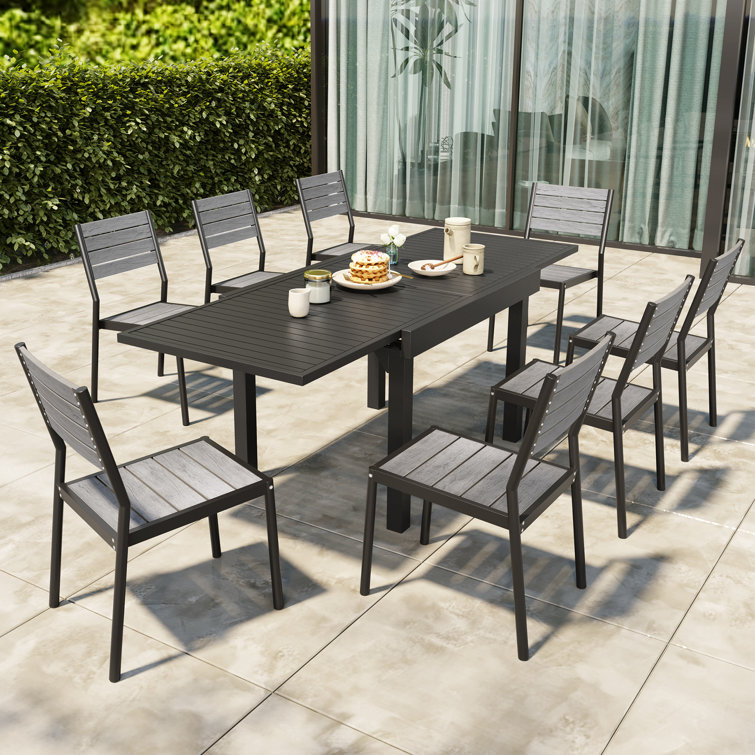 Hokku Designs Betanya 9 Piece Rectangular 8 Person Outdoor Dining Set Extendable Metal Table 8 Chairs Wayfair